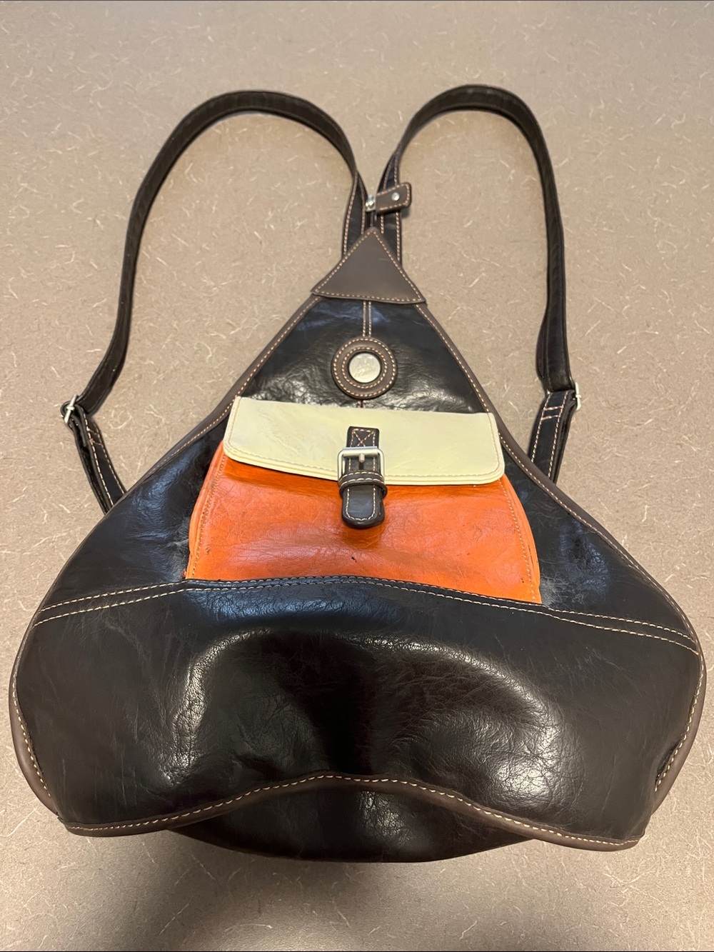 Leather Triangular Sling Backpack - Black with Orange & Cream Pocket - As is